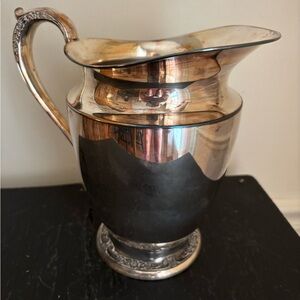 Vintage Rogers & Bros 2317 footed, handle, silver plated water pitcher